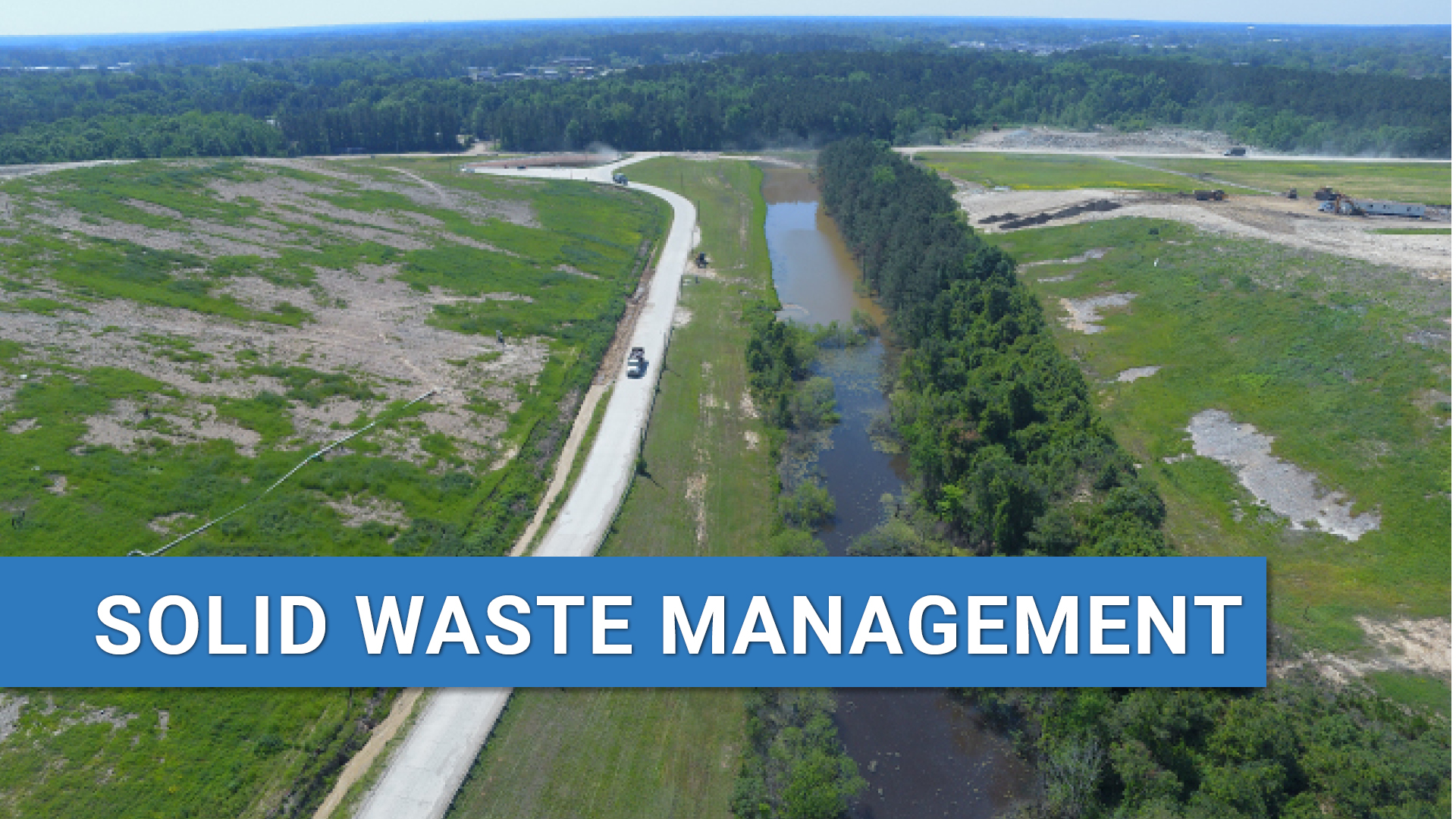 High angle view of Ann Street landfill with text: Solid Waste Management.