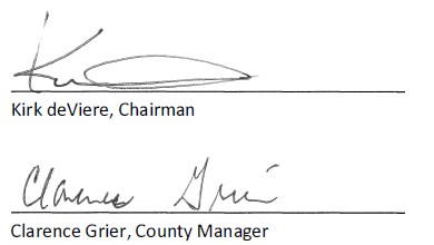 Signature of Kirk deViere, Chairman and Clarence Grier, County Manager 