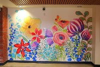 "Blooming with Purpose" mural at West Regional Library - Front Entrance