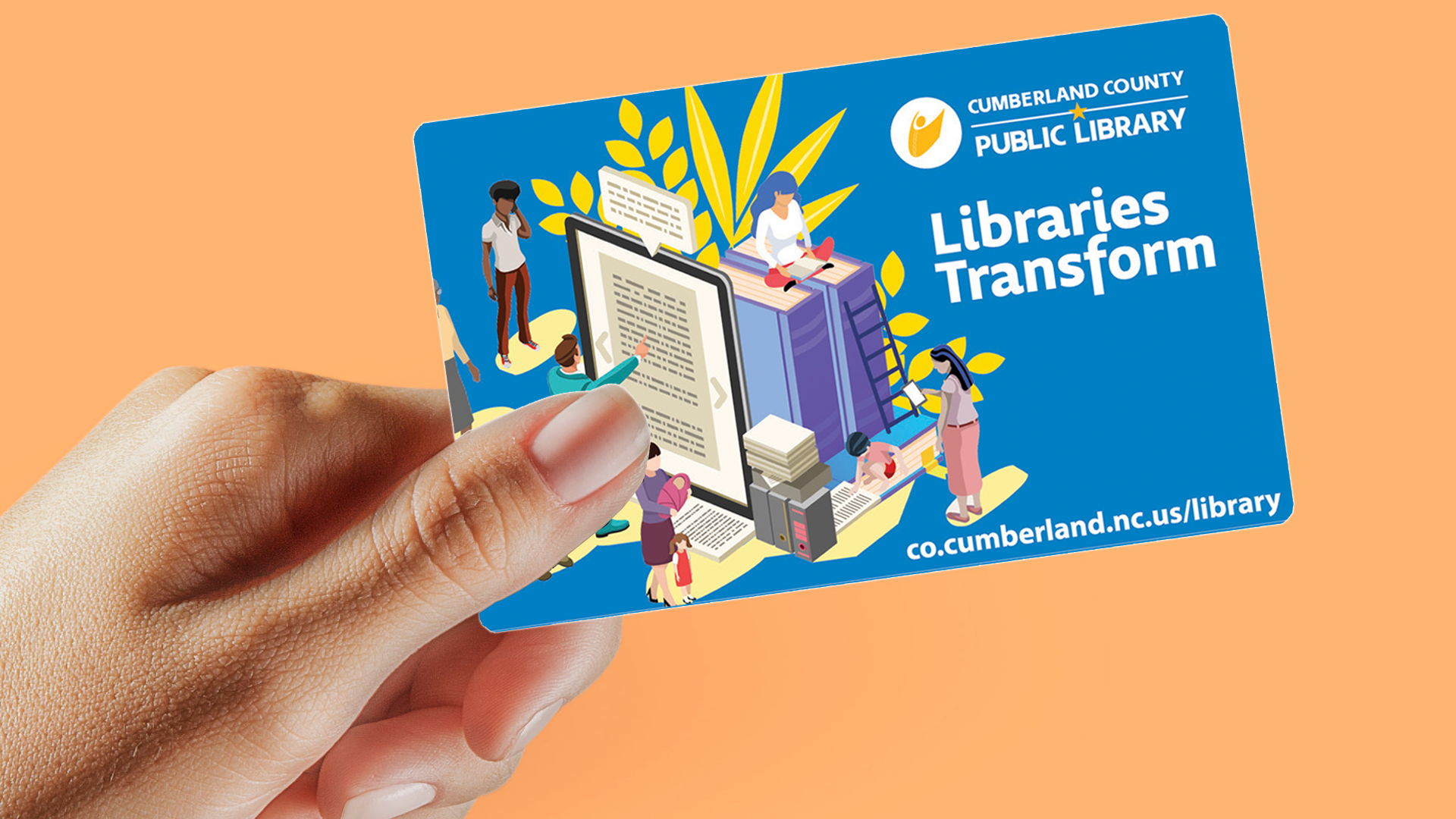 Hand holding a library card